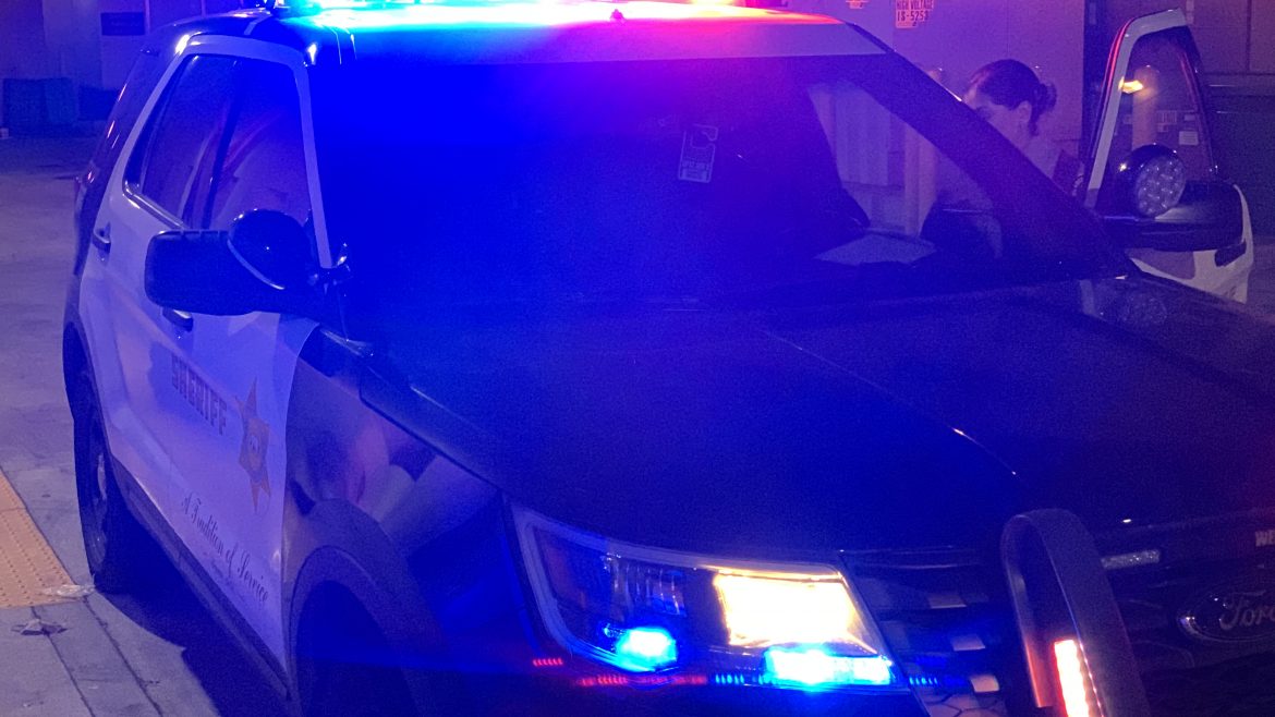 Patrol car with red lights on