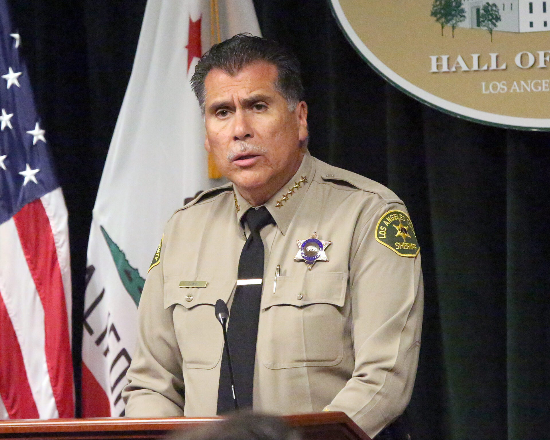 Sheriff Robert Luna at a podium